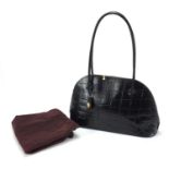Burberry black leather crocodile skin design handbag, the bag numbered 226287, with protective carry