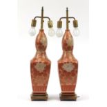 Pair of Japanese Satsuma pottery table lamps mounted onto wooden bases, 75cm high