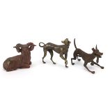 Two Japanese patinated bronze animals comprising goat and dog, together with one other dog, the