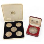 Commemorative silver metal medallions including Winston Churchill and five Apollo 11