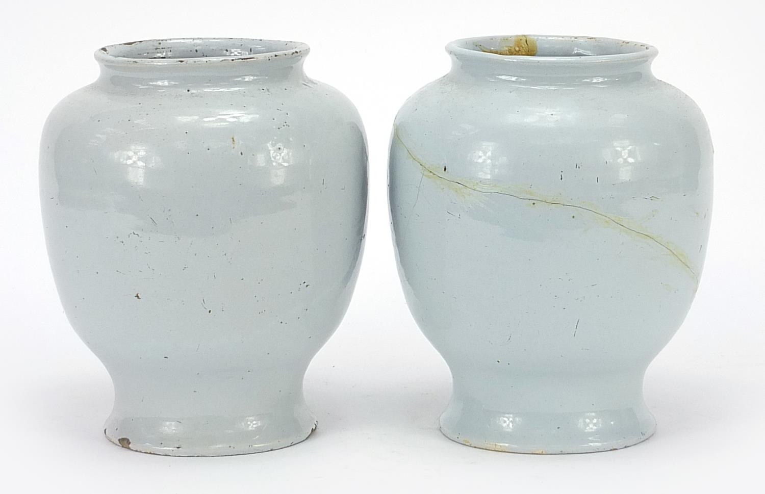 Two 18th century Delft blue and white tin glazed drug jars, 19cm high - Image 2 of 4