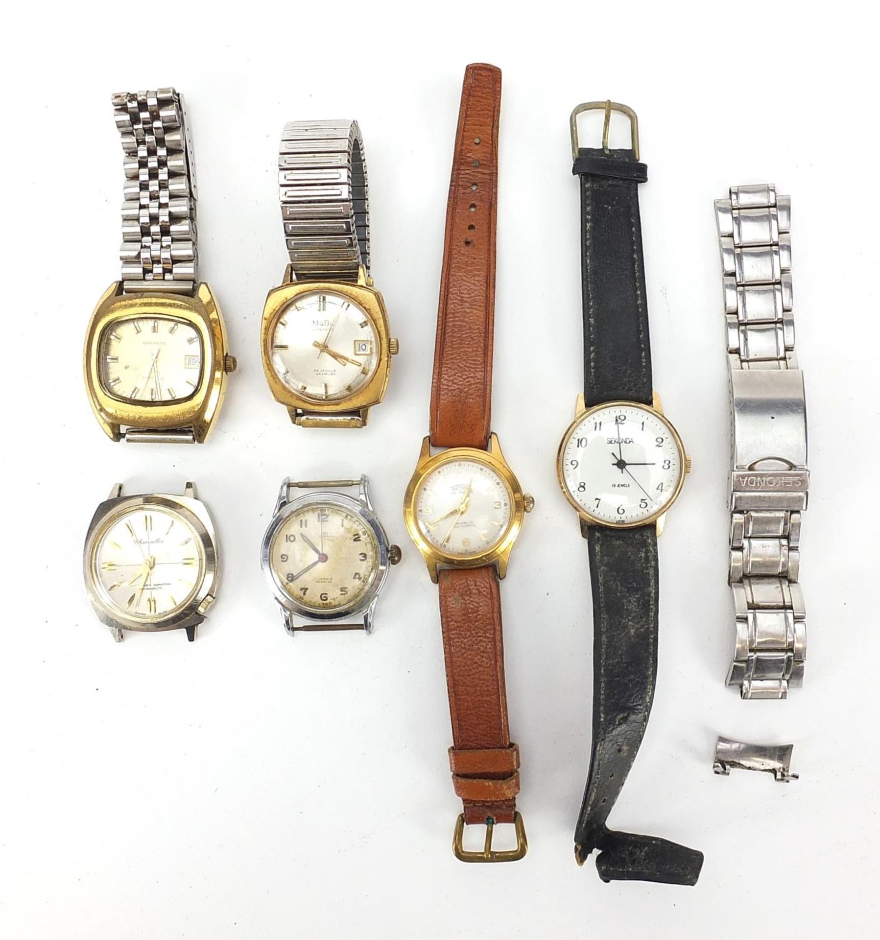 Six vintage gentlemen's wristwatches including Thorne Automatic, Garrard Automatic and Mudu