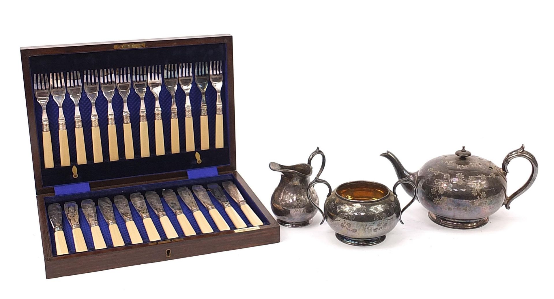 J H Potter, canteen of twelve fish knives and forks and a Victorian silver plated three piece tea