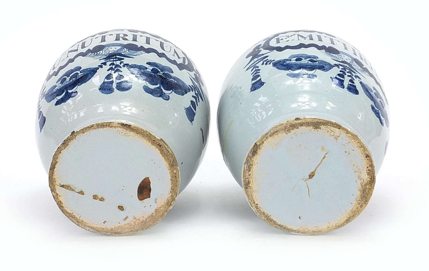 Two 18th century Delft blue and white tin glazed drug jars, 19cm high - Image 4 of 4