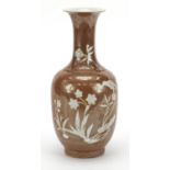 Chinese porcelain brown ground vase decorated in relief with a bird amongst flowers, six figure