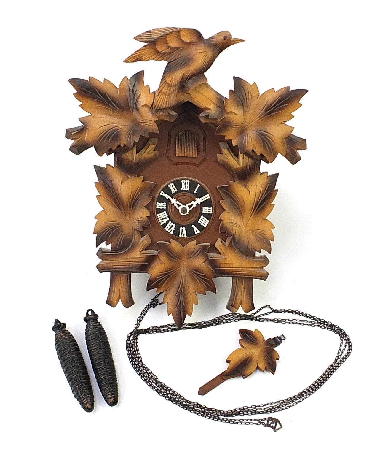 Carved Black Forest cuckoo clock, 38cm high