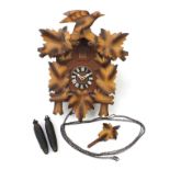 Carved Black Forest cuckoo clock, 38cm high