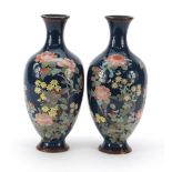 Pair of Japanese cloisonne vases enamelled with birds amongst flowers, each 25cm high