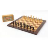Staunton pattern chess set by K & C Ltd of London together with an inlaid wooden chess board, the