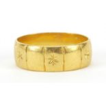 22ct gold wedding band with engraved decoration, size R, 6.8g