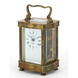 L'Epee, French brass cased serpentine carriage clock, 11.5cm high
