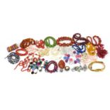 Vintage and later costume jewellery including amber coloured beads, millefiori glass beads, coral
