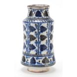 Turkish pottery Albarello vase hand painted with leaves, 18.5cm high