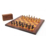 Mahogany and boxwood inlaid chess board and a Staunton pattern chess set