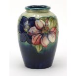 Large Moorcroft pottery vase hand painted with flowers, signature and marks to the base, 24cm high
