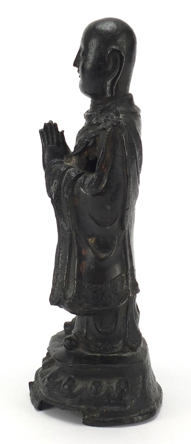 Chinese patinated bronze figure of a standing monk, 24.5cm high - Image 3 of 7