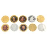 Ten commemorative coins depicting American eagle, Queen Elizabeth II and others
