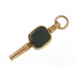 Unmarked gold bloodstone and carnelian watch key fob, 3.2cm in length, 2.0g