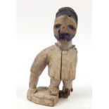 Tribal interest carved wood figure, possibly from New Guinea, 35cm high