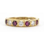 18ct gold diamond and ruby half eternity ring, the diamonds approximately 3.2mm in diameter, size R,