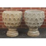 Pair of stoneware garden pinecone design planters, 49cm high