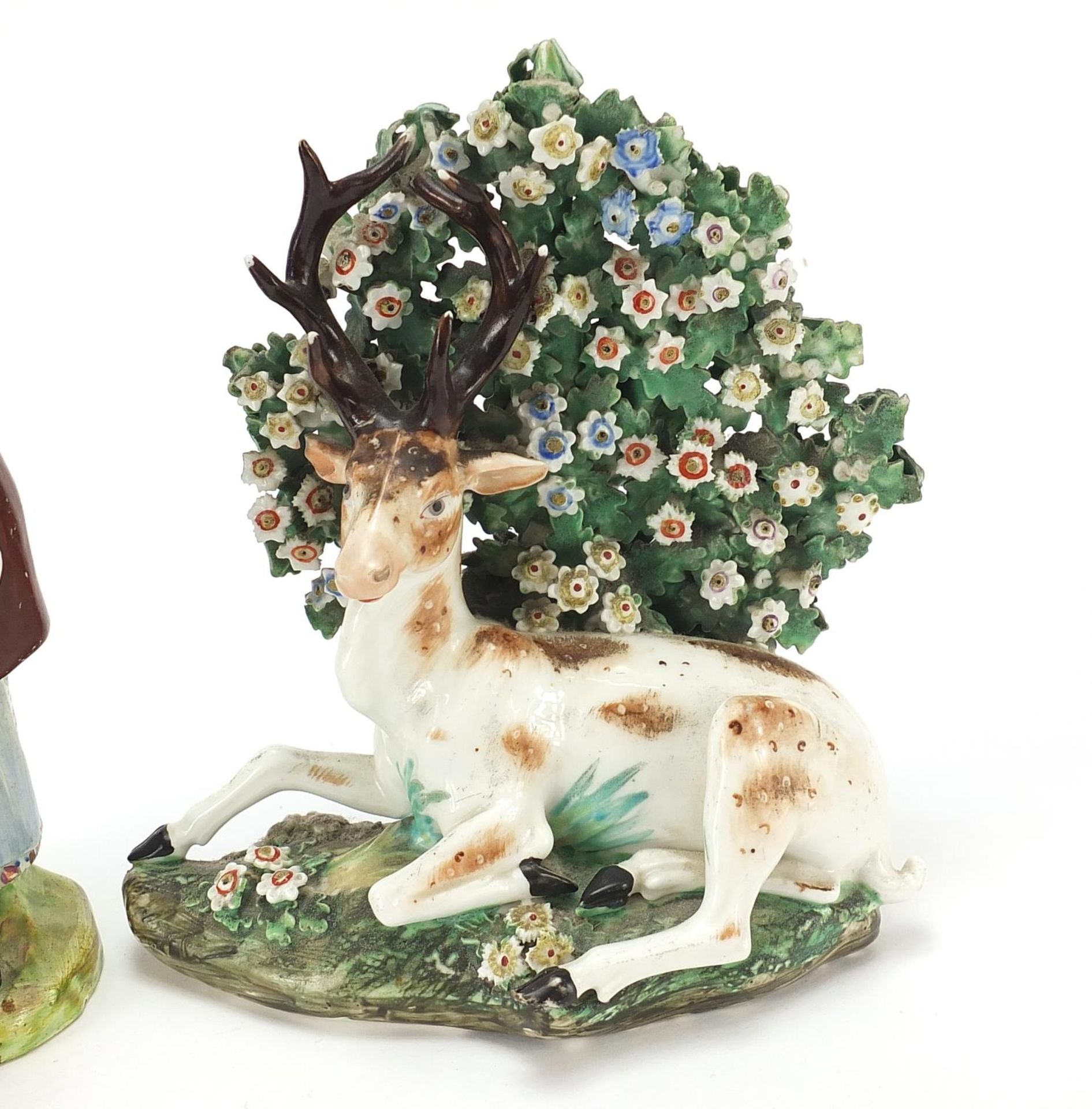 Antique china comprising a recumbent stag under a bush and an old woman carrying a basket, the - Image 3 of 6