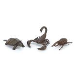 Three Japanese patinated bronze animals comprising scorpion, tortoise and Hercules beetle, each with