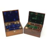 Two rosewood work boxes with mother of pearl inlay and fitted interiors, the largest 17cm H x 30cm W