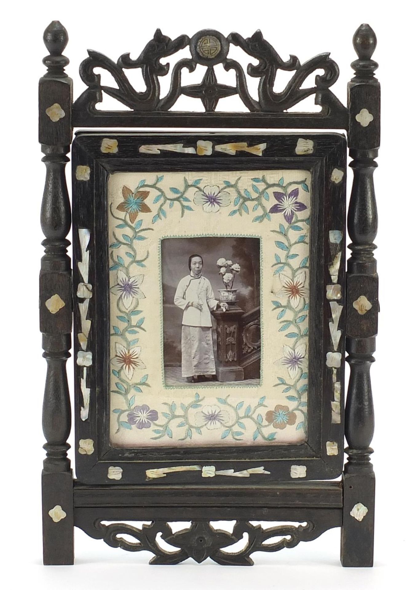 Chinese hardwood screen with mother of pearl inlay housing a black and white photograph of a