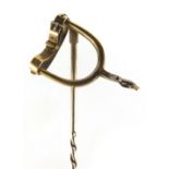 Unmarked gold spur design stick pin, 4.5cm in length, 2.9g