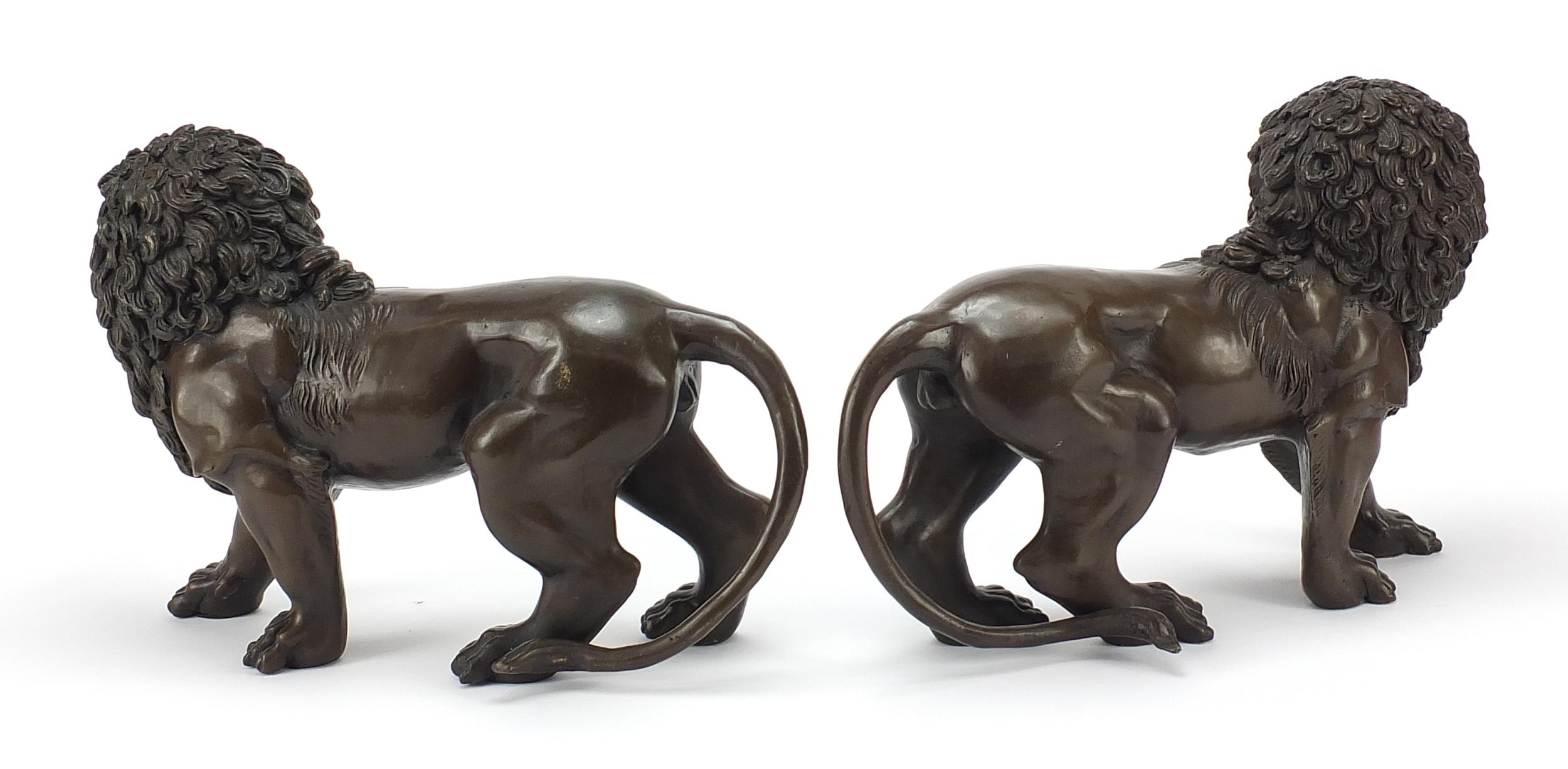 Pair of large patinated bronze standing lions, 30cm in length - Image 3 of 5