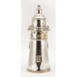 Large silver plated cocktail shaker in the form of a lighthouse, 35cm high