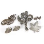 Silver jewellery comprising two marcasite brooches, two pairs of marcasite earrings and a maple leaf