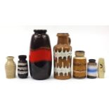 Seven West German pottery vases, one with handle, the largest 49cm high