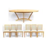 Contemporary light oak oval extending dining table with six chairs, the table 65cm H x 160cm W x