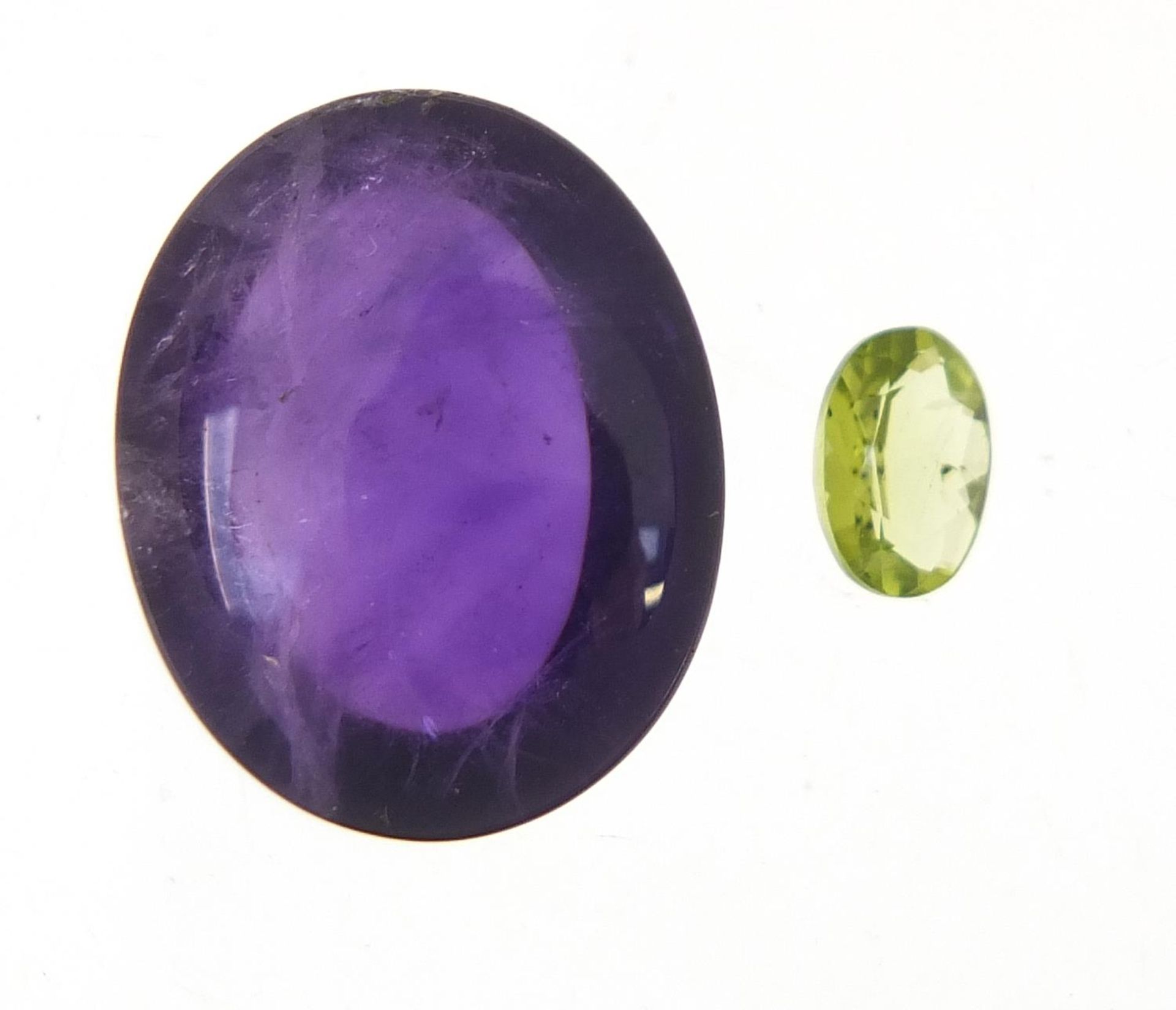 Two gemstones with certificates comprising amethyst 18.20 carat and peridot 0.75 carat - Image 2 of 3