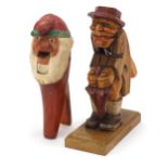 Two carved Black Forest nutcrackers including one in the form of a gnome, the largest 23cm high