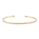 Unmarked gold bangle, (tests as 9ct gold) 7cm wide, 9.5g