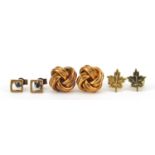 Three pairs of 9ct gold earrings including a pair set with sapphires, the largest 1cm in diameter,