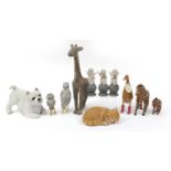 Decorative animals and figurines including two zebras and a wooden duck, the largest 54cm high