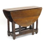 Antique oak gateleg table with bobbin legs, 72cm H x 120cm W extended x 100cm D