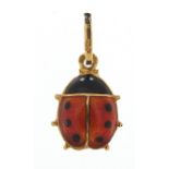 18ct gold and enamel ladybug charm, 1.5cm in length, 0.6g