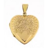 9ct gold back and front love heart locket with engraved decoration, 3.2cm high, 4.3g