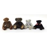 Four Deans Rag Book teddy bears with articulated arms and legs, the largest 34cm high