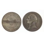 Two white metal 19th century medallions commemorating Crystal Palace, one of Sir Joseph Paxton, both