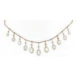 Antique 9ct gold blue stone and seed pearl necklace, possibly aquamarine, 36cm in length,