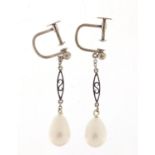 Pair of 9ct white gold pearl drop earrings with screw backs, 3cm high, 2.3g