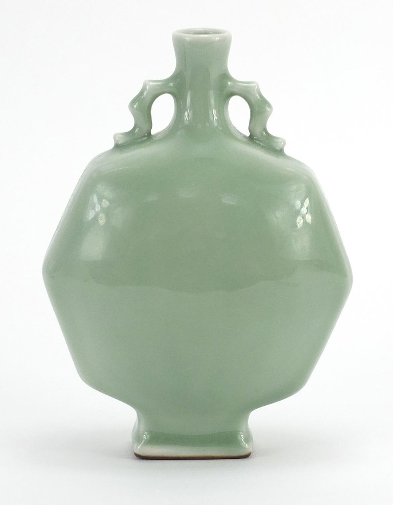 Chinese porcelain octagonal moon flask with twin handles having a celadon glaze, four figure