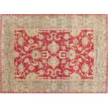 Large Indian hand woven red ground rug, 348cm x 274cm