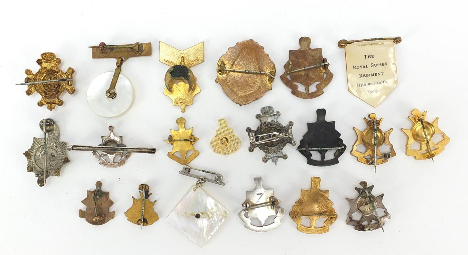 Twenty British military badges including Royal Sussex and Cinq Ports brooches including enamel and - Image 7 of 7